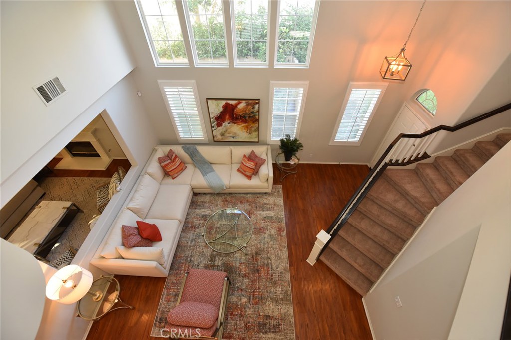 24 Silveroak Irvine, CA 92620 - Photo 51 of 64 a living room with furniture and a window
