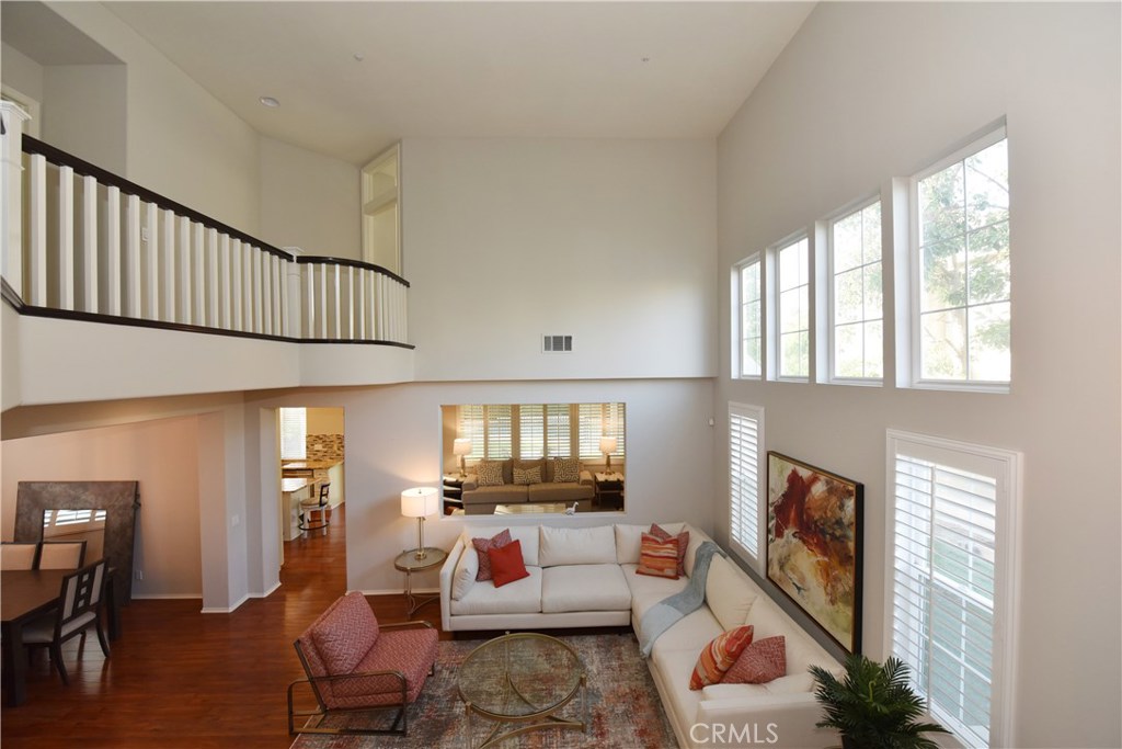 24 Silveroak Irvine, CA 92620 - Photo 52 of 64 a living room with furniture fireplace and a window