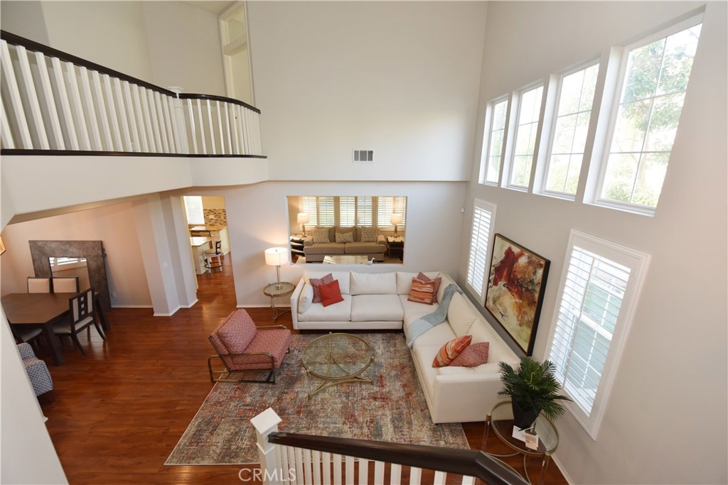24 Silveroak Irvine, CA 92620 - Photo 53 of 64 a living room with furniture and a window