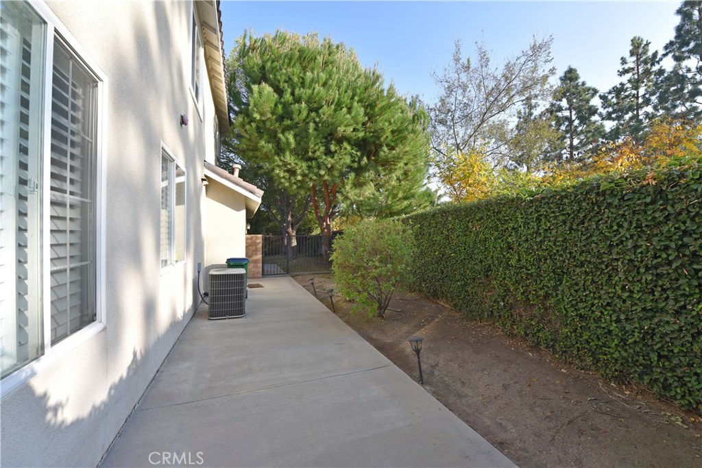 24 Silveroak Irvine, CA 92620 - Photo 56 of 64 a view of a pathway of a house with a tree