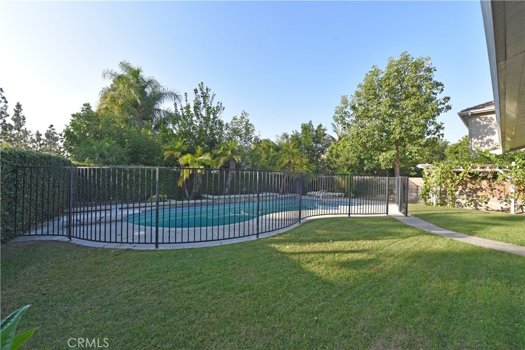 24 Silveroak Irvine, CA 92620 - Photo 58 of 64 a view of a backyard with a garden and entertaining space