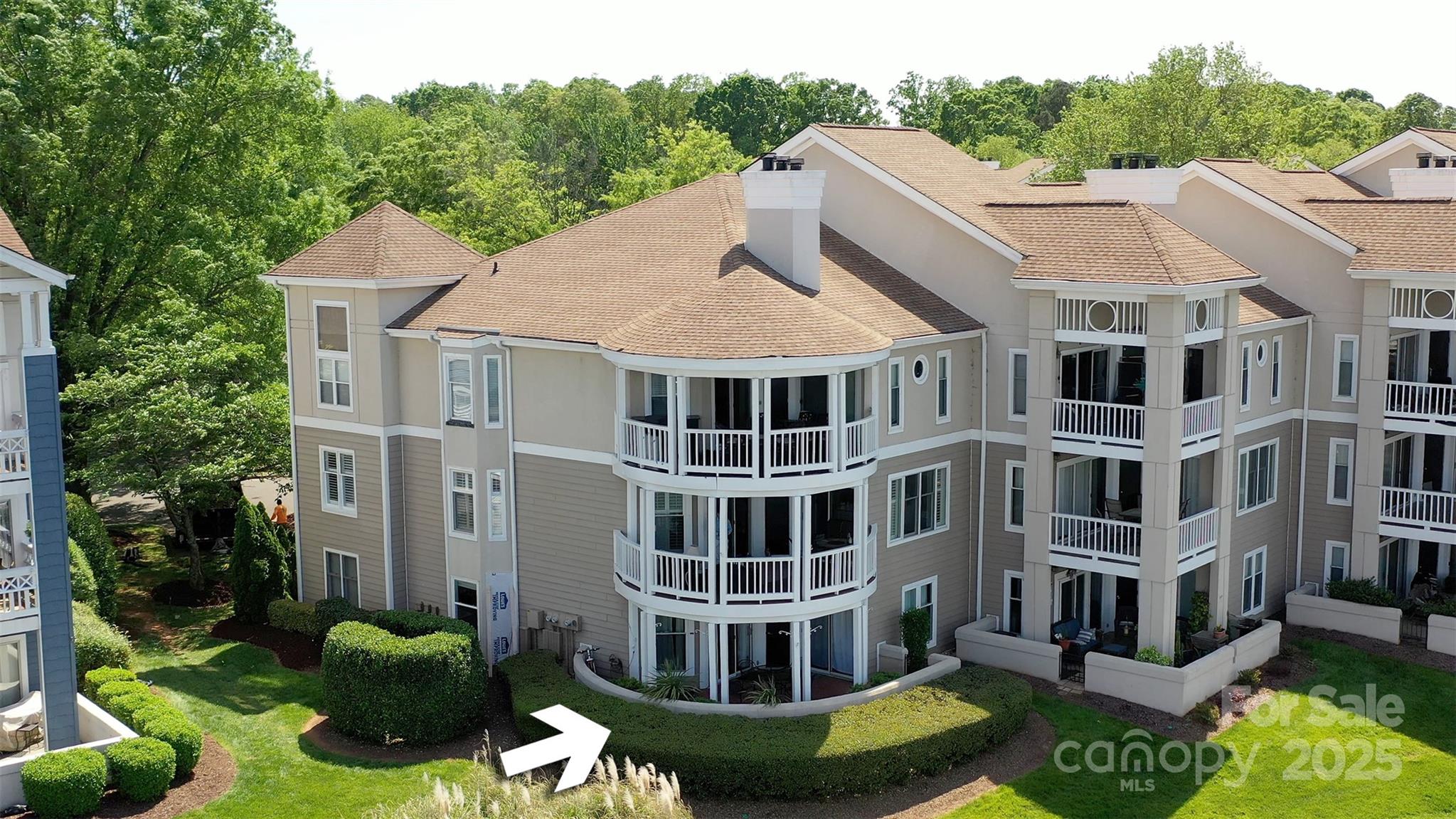 18647 Vineyard Point Lane Cornelius, NC 28031 - Photo 3 of 36 a aerial view of a house next to a yard