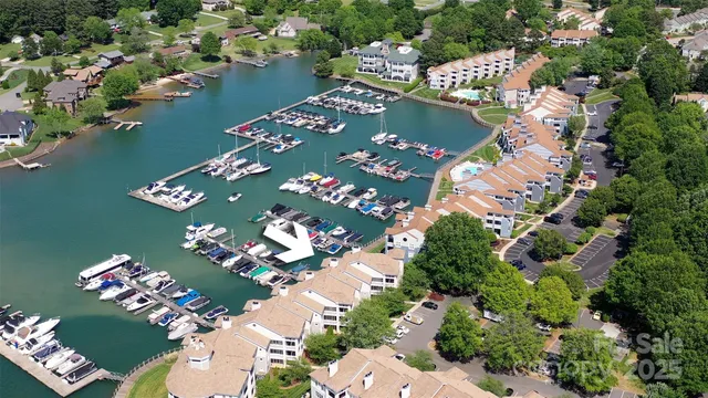 an aerial view of a house swimming pool and outdoor space