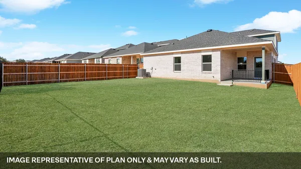 a sign board with a wooden fence