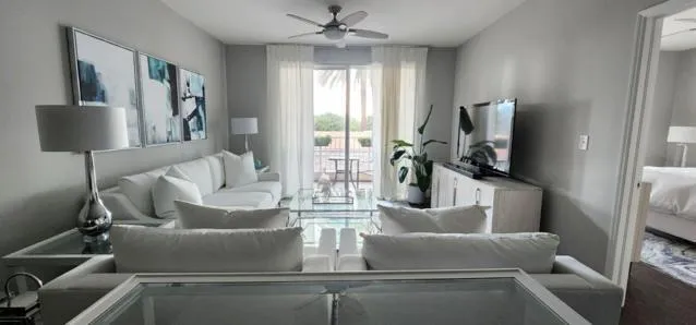 a view of a kitchen with a sink and cabinets