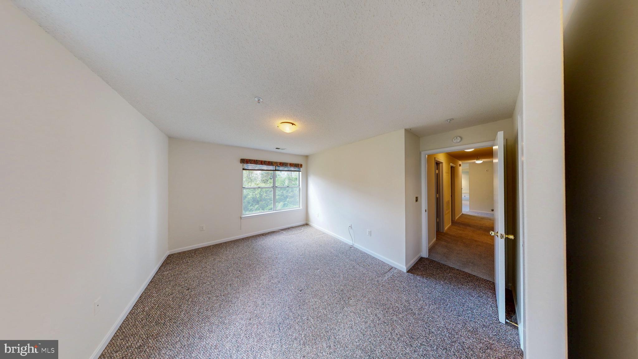 2806 Clear Shot Drive, Unit 3 Silver Spring, MD 20906 - Photo 12 of 20 a view of an empty room with a window
