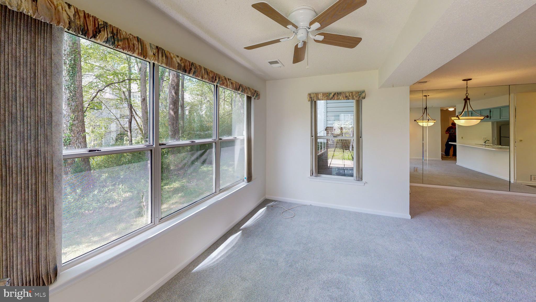 2806 Clear Shot Drive, Unit 3 Silver Spring, MD 20906 - Photo 2 of 20 a view of an empty room with a window