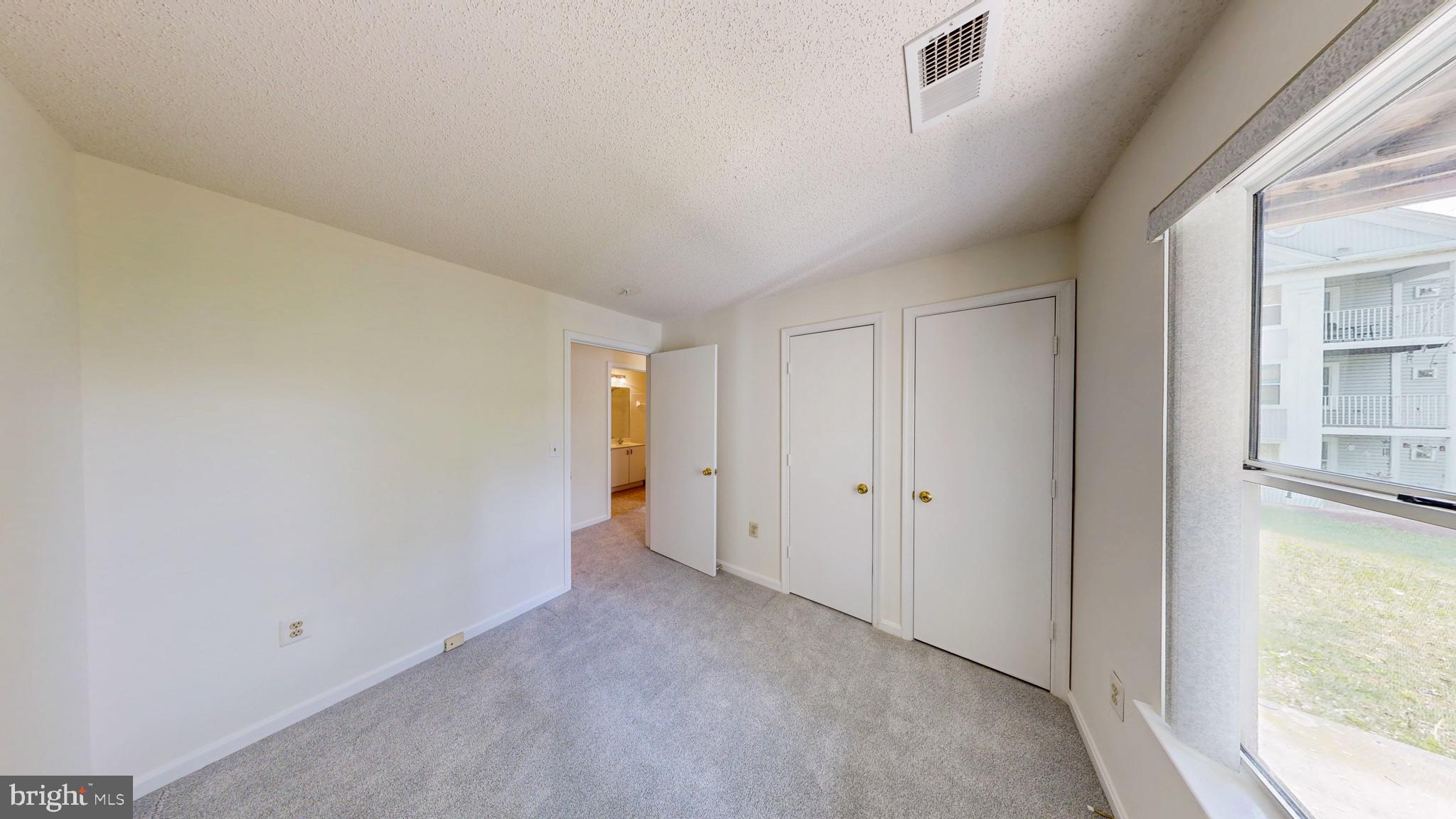 2806 Clear Shot Drive, Unit 3 Silver Spring, MD 20906 - Photo 5 of 20 a view of an empty room and a window
