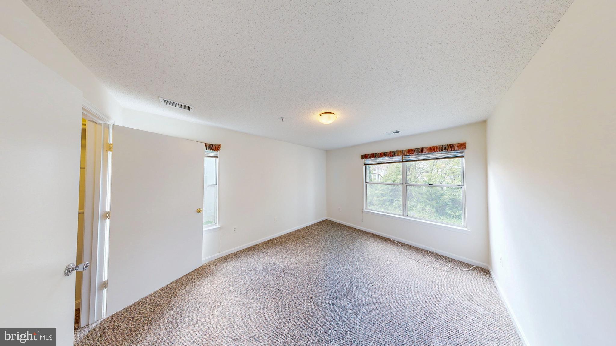 2806 Clear Shot Drive, Unit 3 Silver Spring, MD 20906 - Photo 10 of 20 an empty room with windows