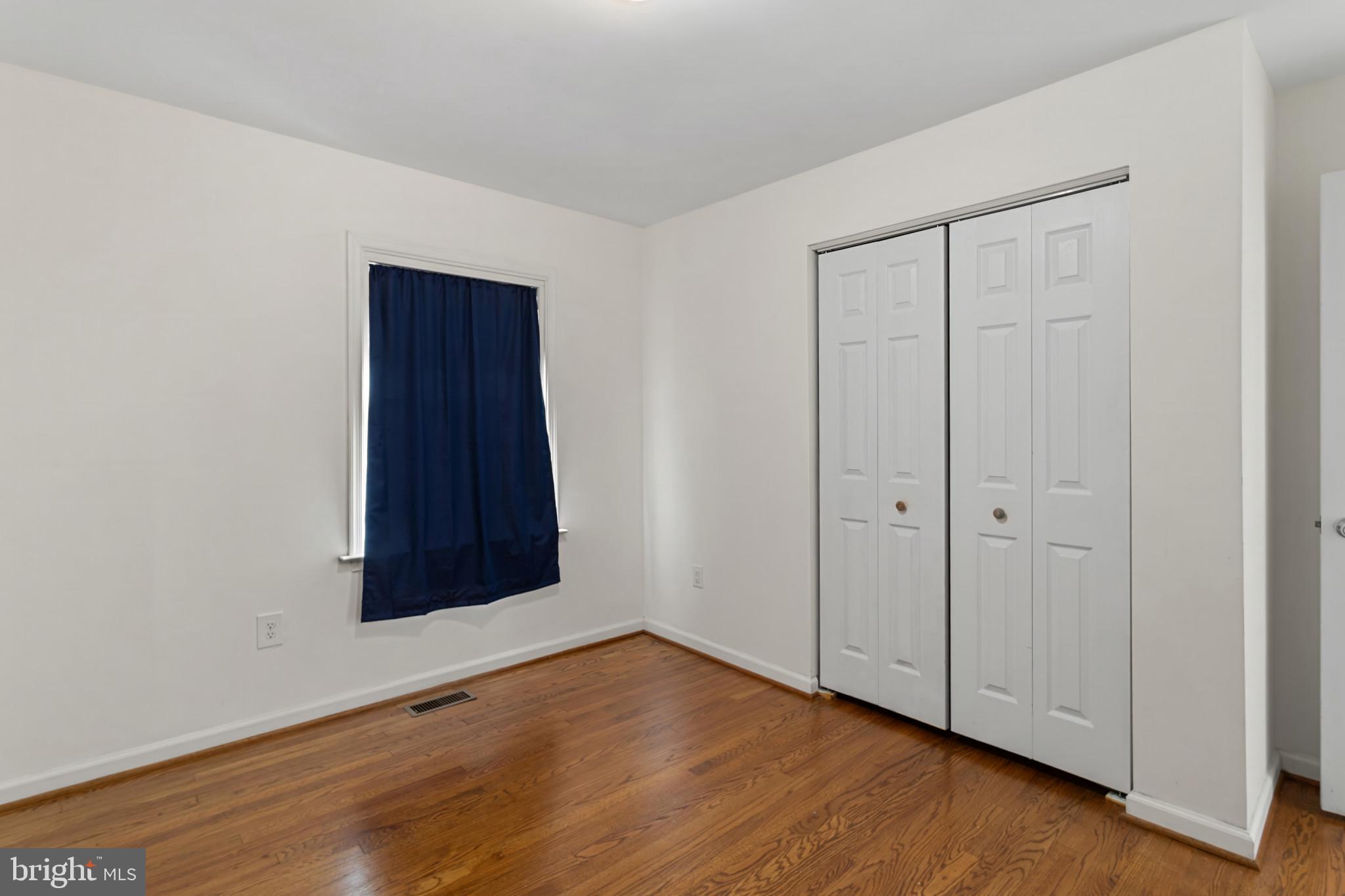 3218 Brethren Church Road Myersville, MD 21773 - Photo 15 of 30 a view of an empty room with wooden floor
