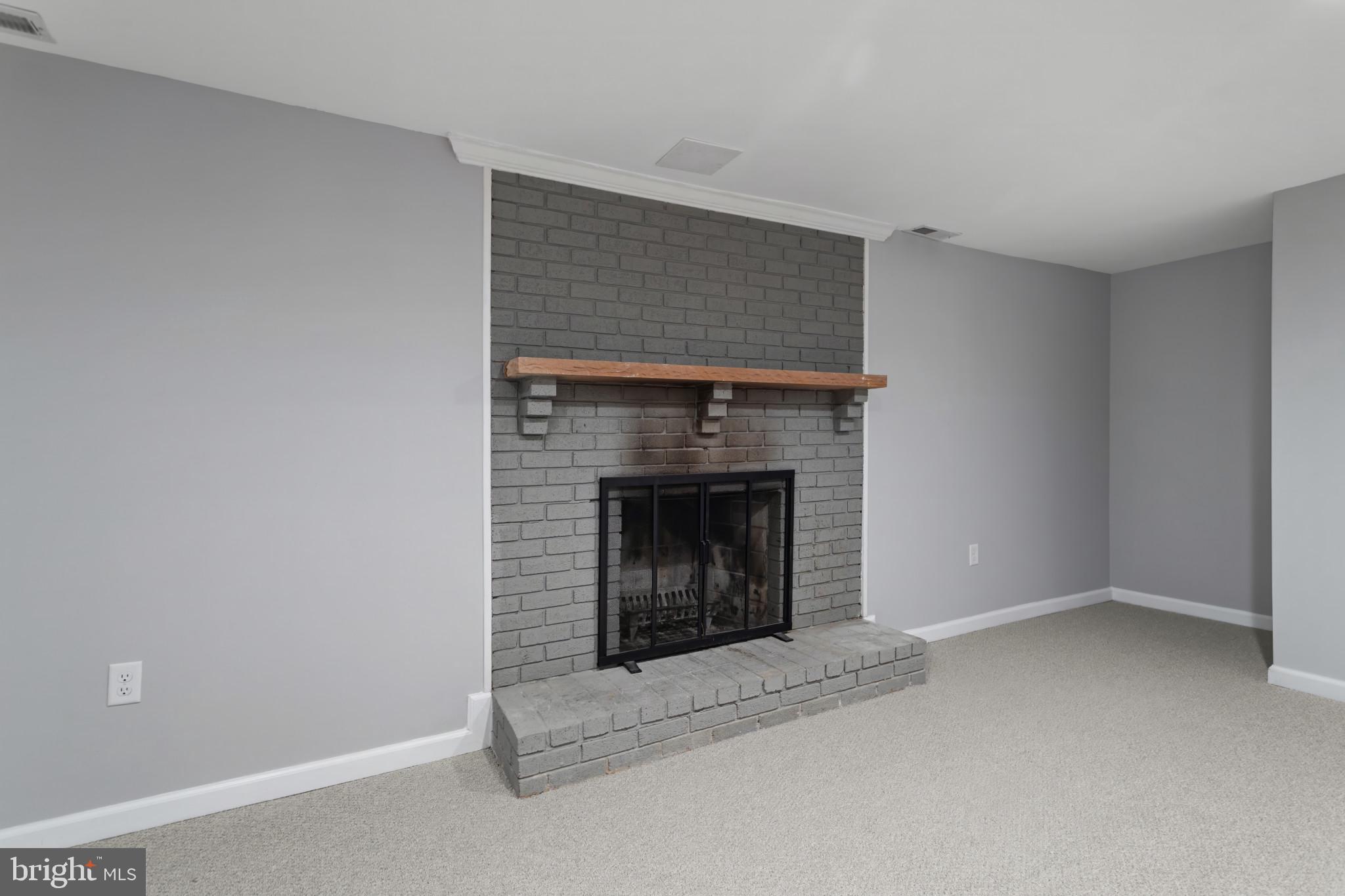 3218 Brethren Church Road Myersville, MD 21773 - Photo 20 of 30 a living room with a fireplace