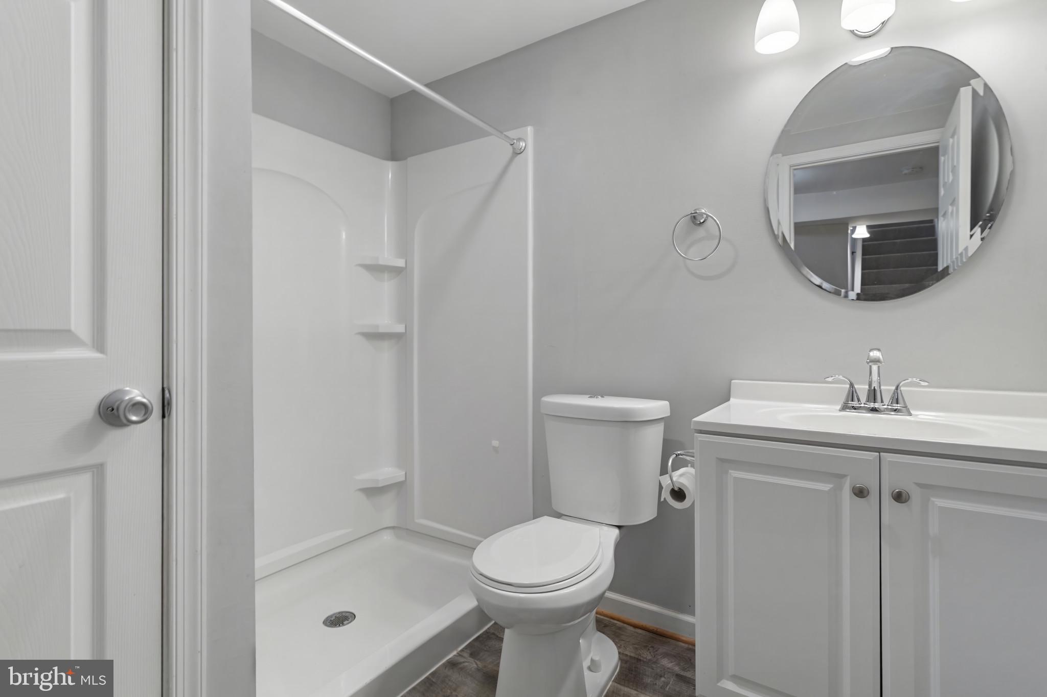 3218 Brethren Church Road Myersville, MD 21773 - Photo 24 of 30 a bathroom with a toilet sink and shower