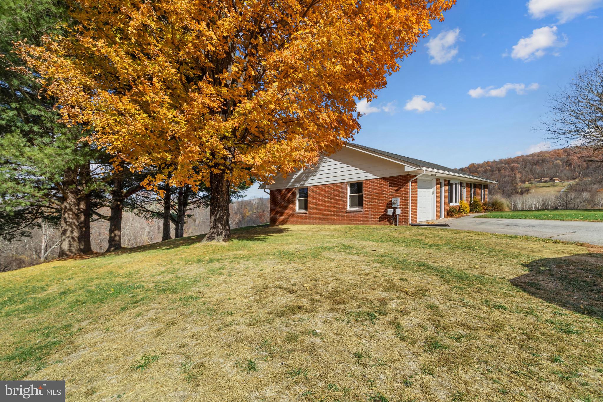 3218 Brethren Church Road Myersville, MD 21773 - Photo 26 of 30 a front view of a house with a garden