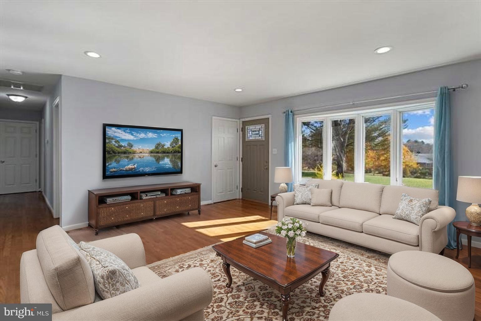 3218 Brethren Church Road Myersville, MD 21773 - Photo 4 of 30 a living room with furniture and a flat screen tv