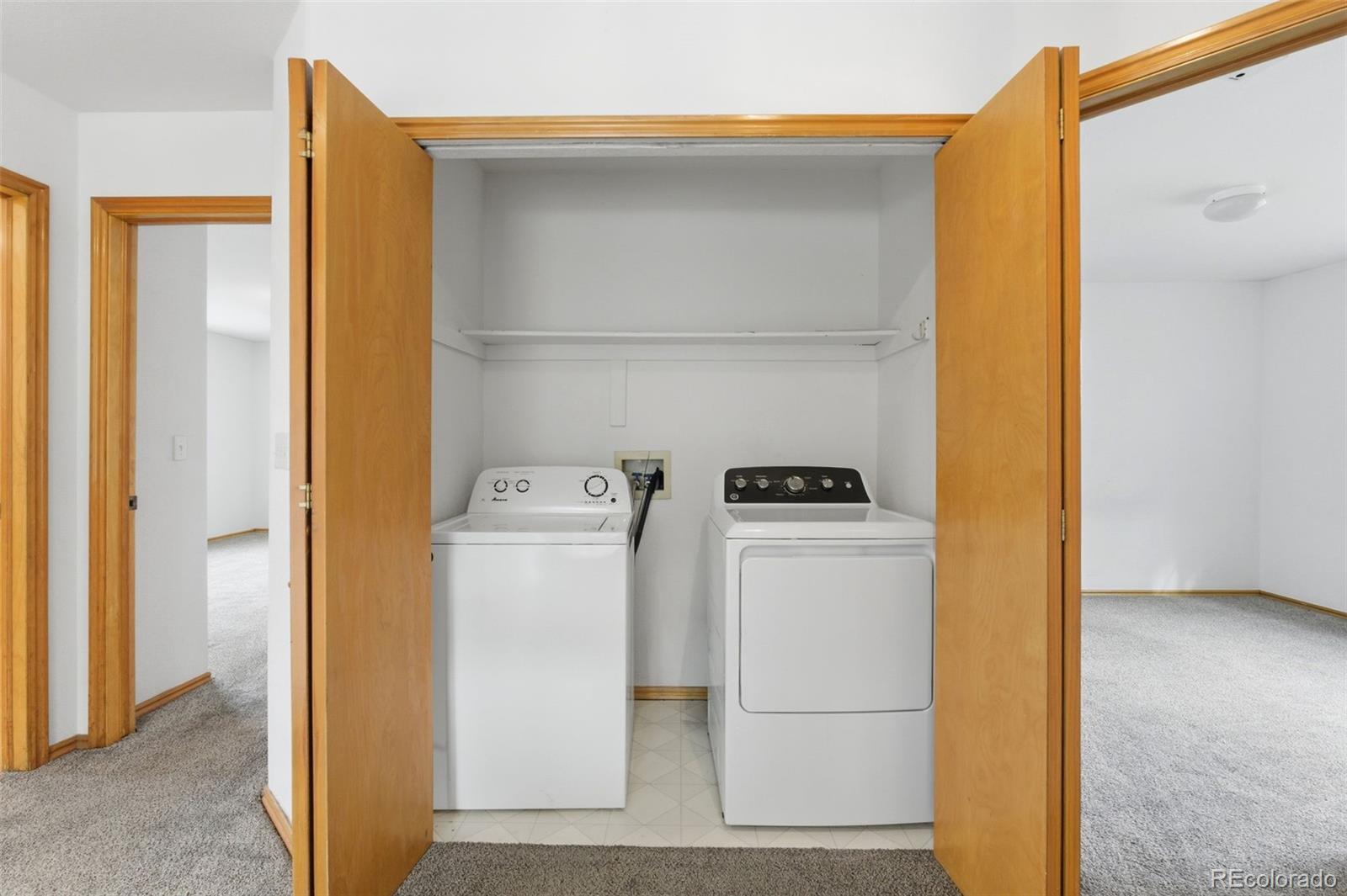 10505 Madison Way Northglenn, CO 80233 - Photo 23 of 49 a utility room with dryer and washer