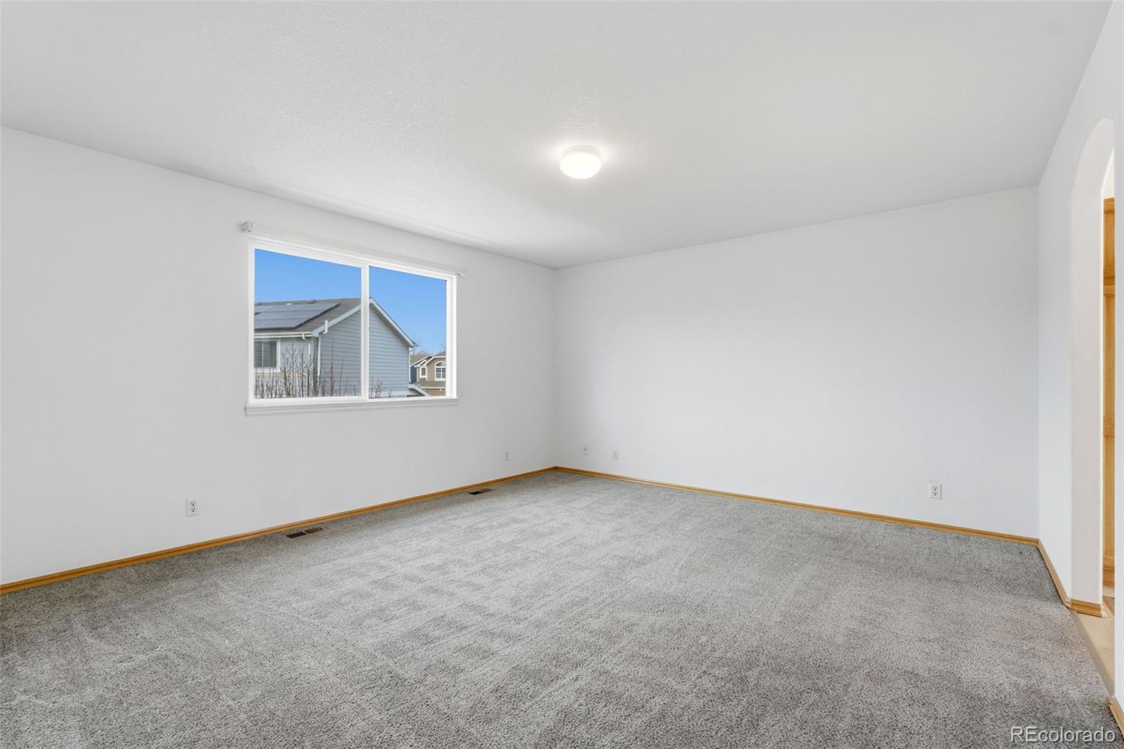 10505 Madison Way Northglenn, CO 80233 - Photo 24 of 49 an empty room with a window