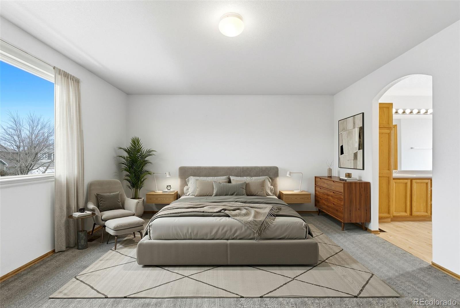 10505 Madison Way Northglenn, CO 80233 - Photo 25 of 49 a bedroom with furniture and a window