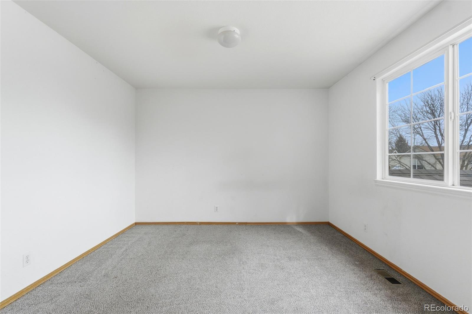 10505 Madison Way Northglenn, CO 80233 - Photo 36 of 49 a view of room and window