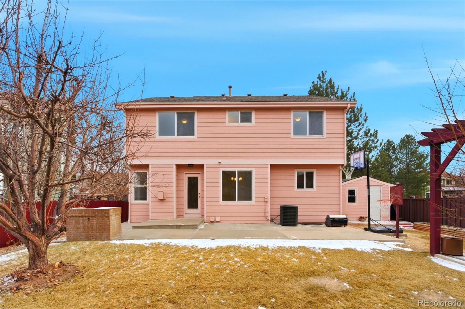 10505 Madison Way Northglenn, CO 80233 - Photo 42 of 49 a front view of a house with a yard