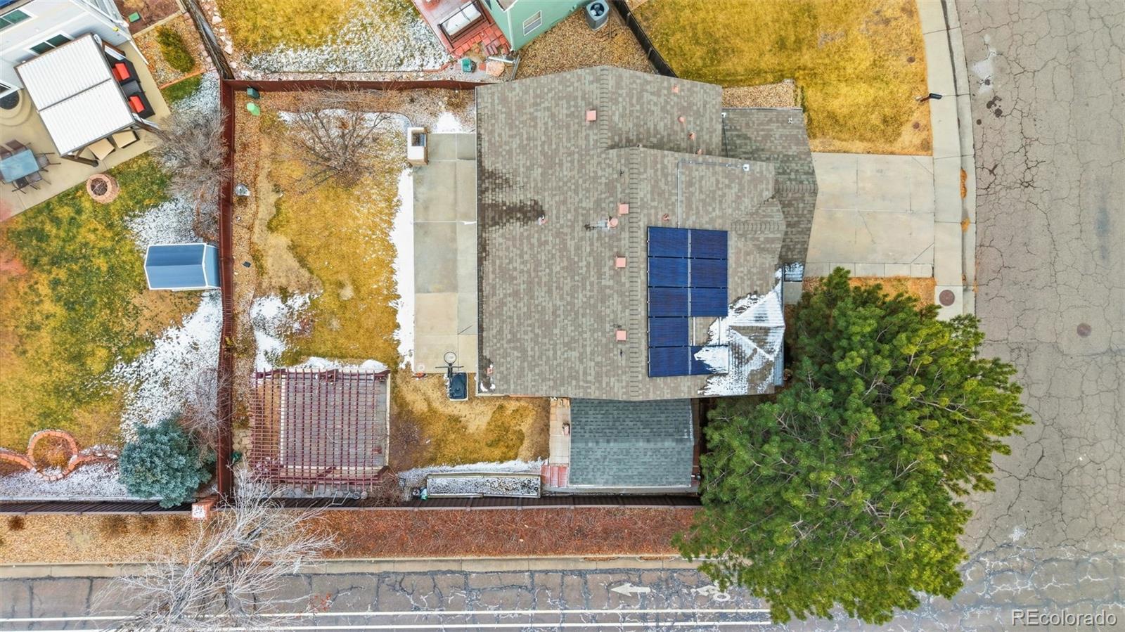 10505 Madison Way Northglenn, CO 80233 - Photo 45 of 49 a front view of a house with a garden