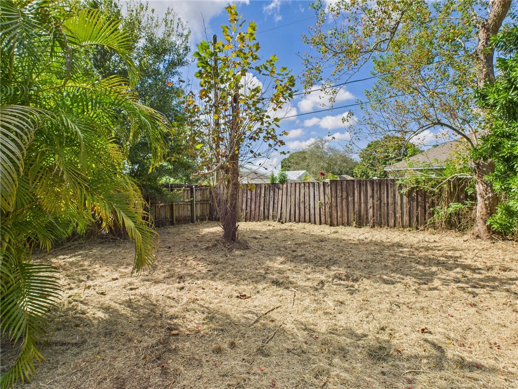 2265 14th Avenue Southwest Vero Beach, FL 32962 - Photo 13 of 20 a view of outdoor space with wooden fence