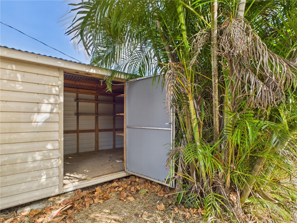 2265 14th Avenue Southwest Vero Beach, FL 32962 - Photo 19 of 20 a view of outdoor space and front view of a house