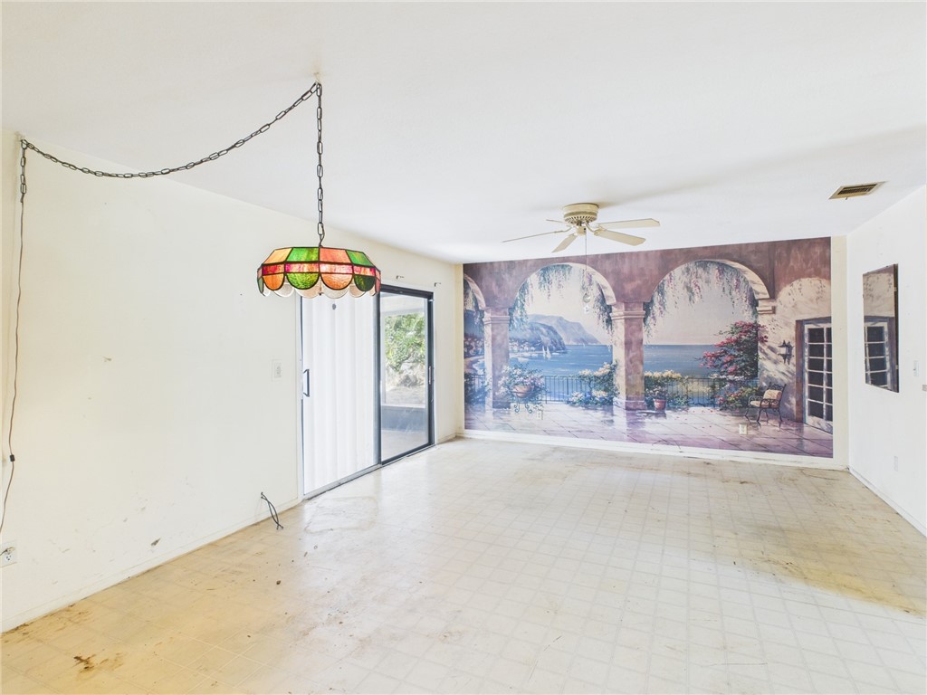 2265 14th Avenue Southwest Vero Beach, FL 32962 - Photo 6 of 20 a view of a room with window and chandelier
