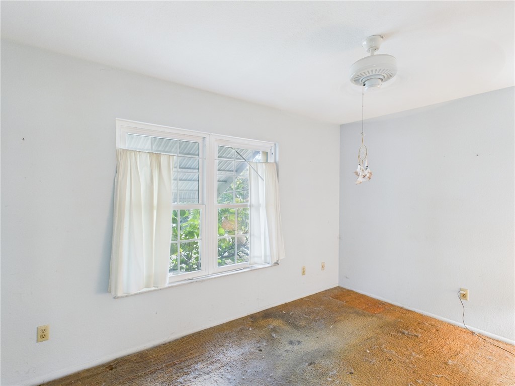 2265 14th Avenue Southwest Vero Beach, FL 32962 - Photo 7 of 20 an empty room with a window
