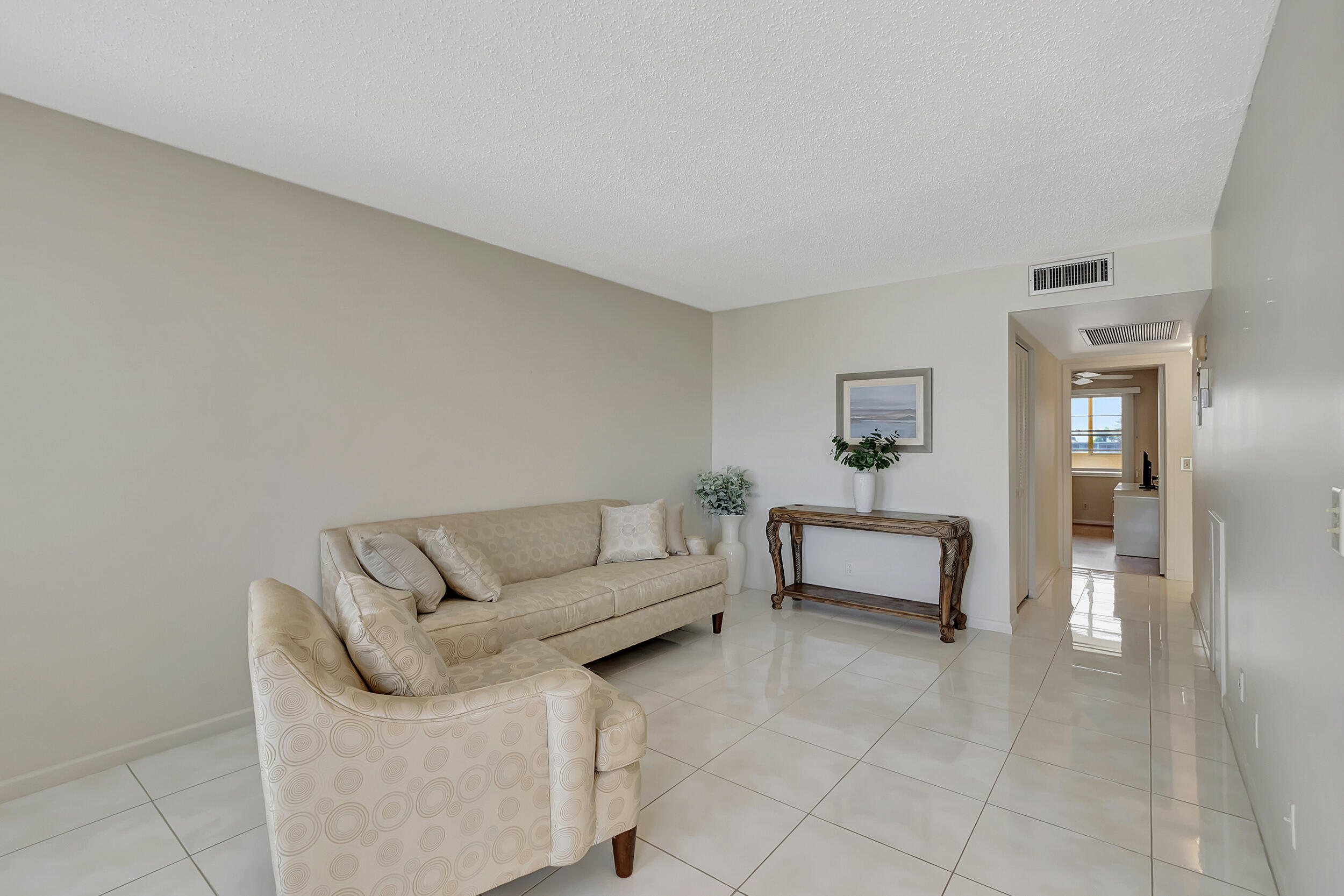 4054 Lincoln C Boca Raton, FL 33434 - Photo 7 of 67 Living Room with view to bedrooms
