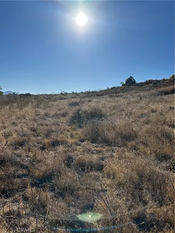 a view of mountains and valleys