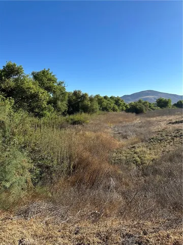 a view of mountain with lake view
