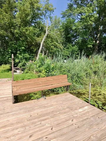 a wooden view of a lake