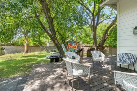 a view of a park with sitting area