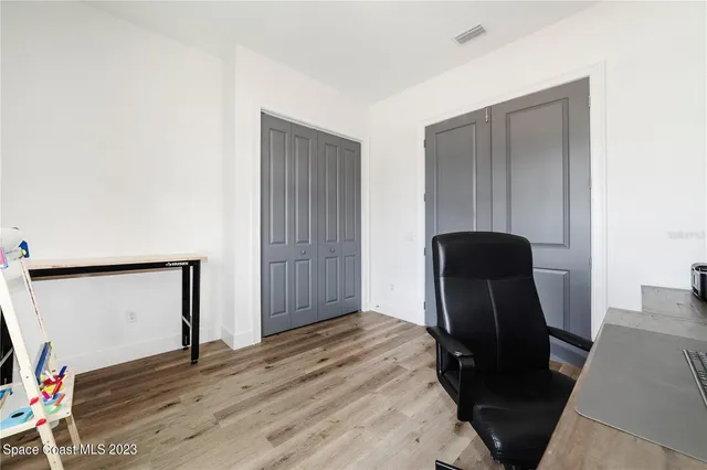 a view of livingroom with furniture and wooden floor
