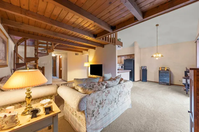 a bed room with a bed and a couch