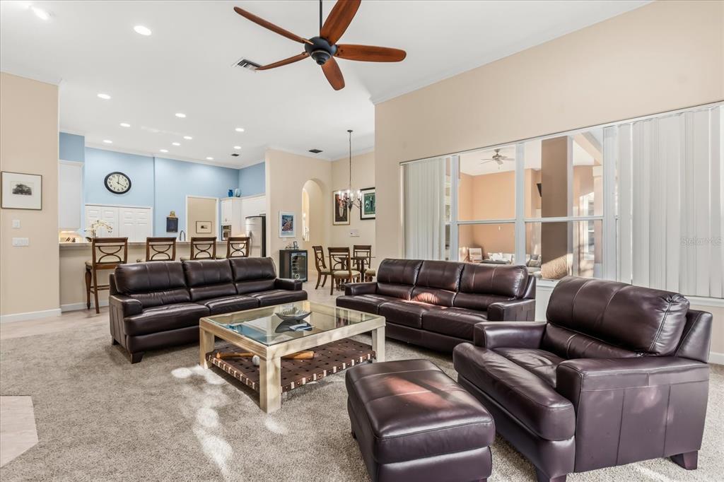 693 Stonefield Loop Lake Mary, FL 32746 - Photo 12 of 40 a living room with furniture and a window