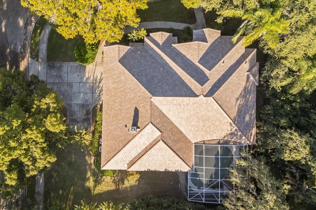 693 Stonefield Loop Lake Mary, FL 32746 - Photo 30 of 40 front view of a house with a yard
