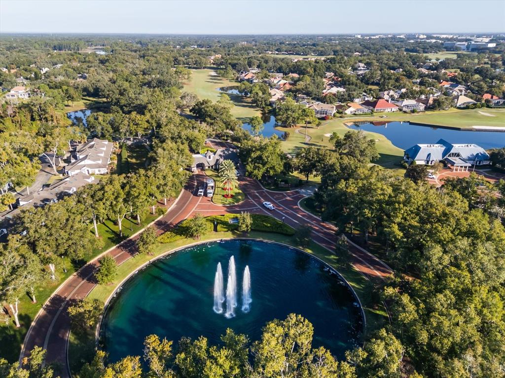 693 Stonefield Loop Lake Mary, FL 32746 - Photo 33 of 40 an aerial view of residential houses with outdoor space and trees