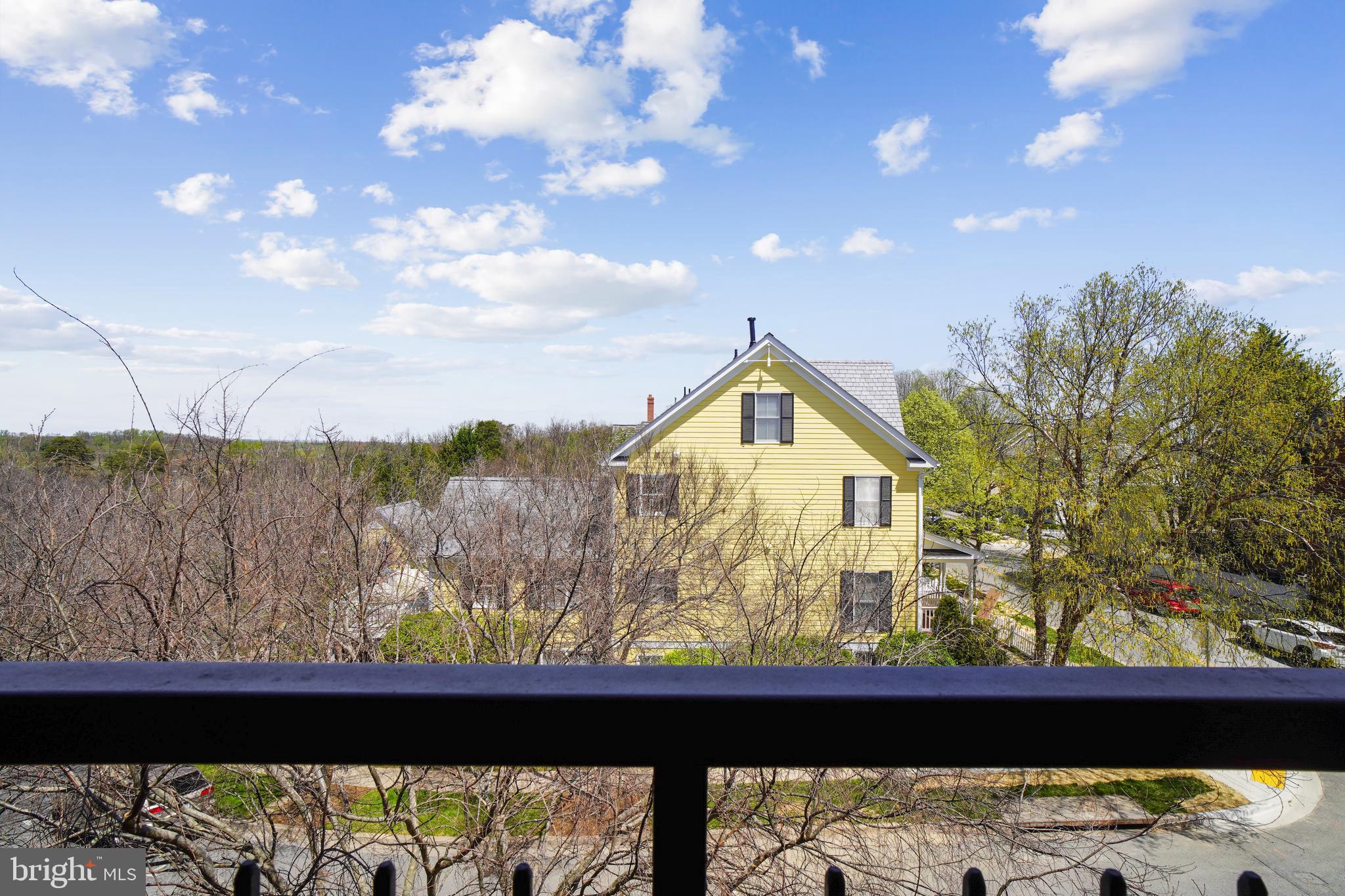 415 Ridgepoint Place, Unit 41534 Gaithersburg, MD 20878 - Photo 26 of 44 You can see forever from the covered balcony