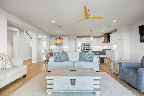 a kitchen with stainless steel appliances a refrigerator and a sink