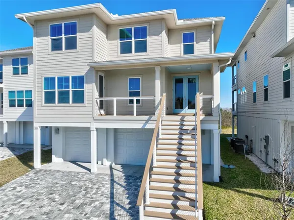 a view of a house with a lounge chair