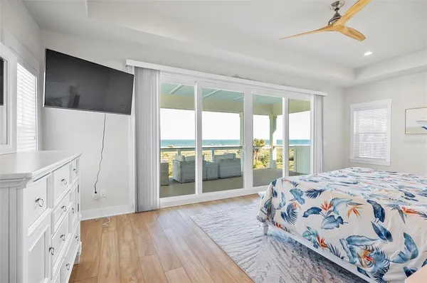 a bedroom with a bed and a cabinets