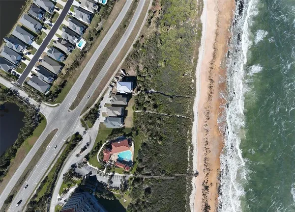 a view of entryway with wooden floor and stairs