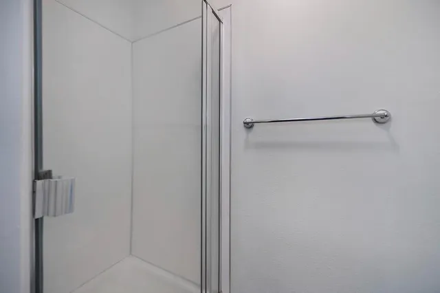 an empty room with wooden floor