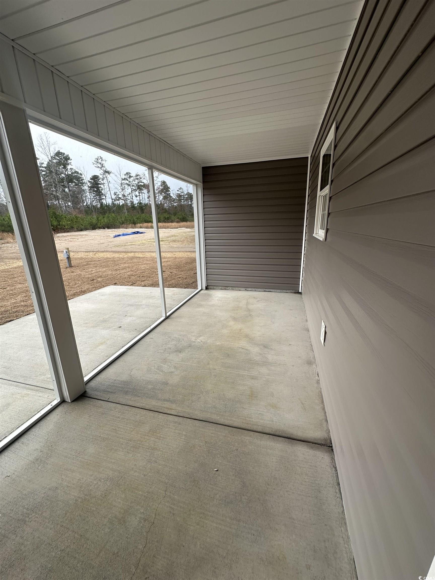 510 Cane Branch Road Loris, SC 29569 - Photo 20 of 28 View of unfurnished sunroom