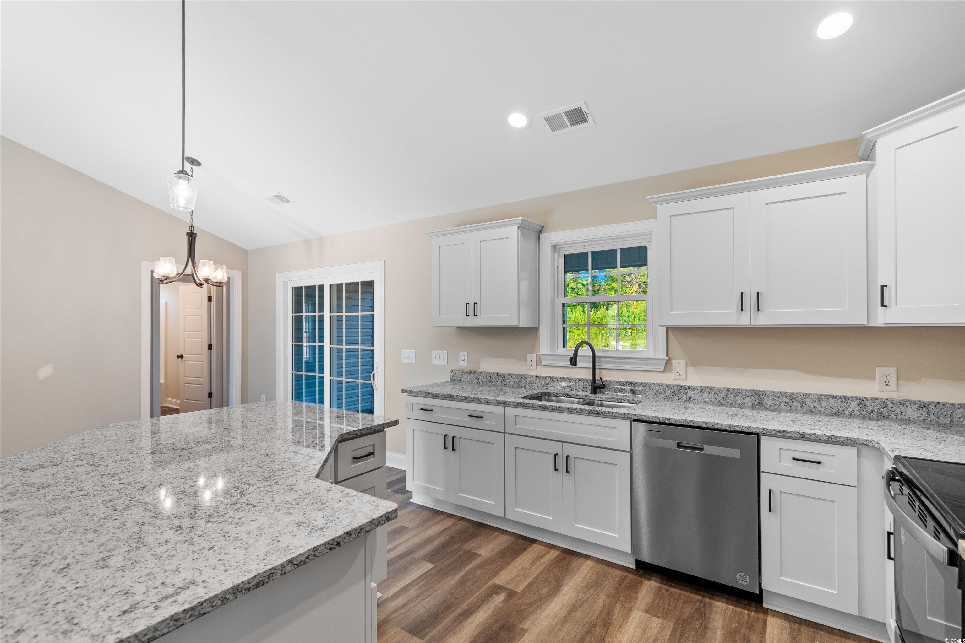 510 Cane Branch Road Loris, SC 29569 - Photo 7 of 28 Kitchen featuring decorative light fixtures, white