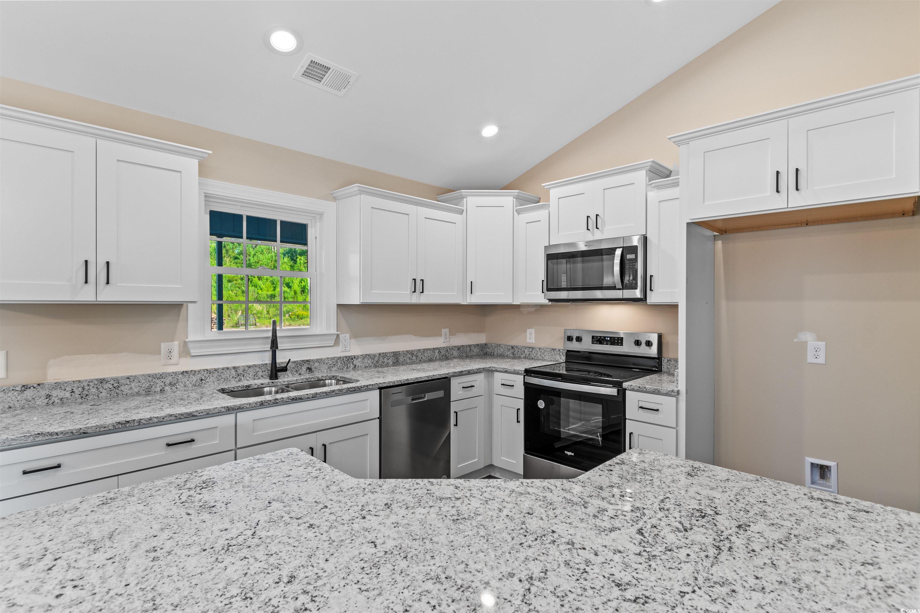 510 Cane Branch Road Loris, SC 29569 - Photo 8 of 28 Kitchen featuring stainless steel appliances, sink