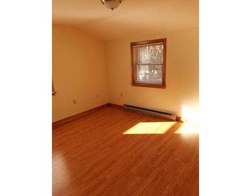 100 Harkness Road Pelham, MA 01002 - Photo 15 of 16 a view of empty room with wooden floor