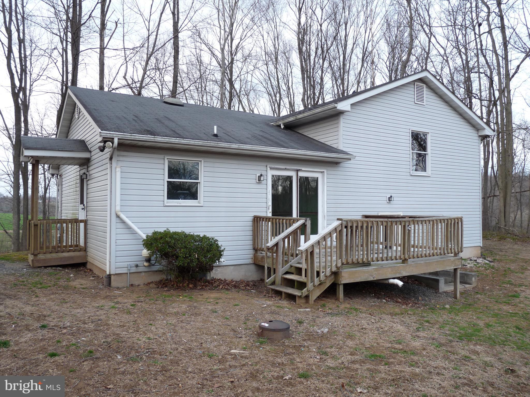 242 West Red Hill Road Conowingo, MD 21918 - Photo 7 of 14 Rear Exterior - Wood Deck off the Kitchen