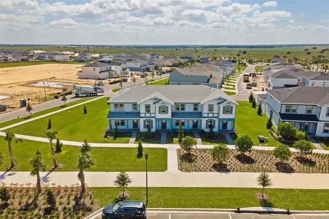 a view of a city with an ocean view